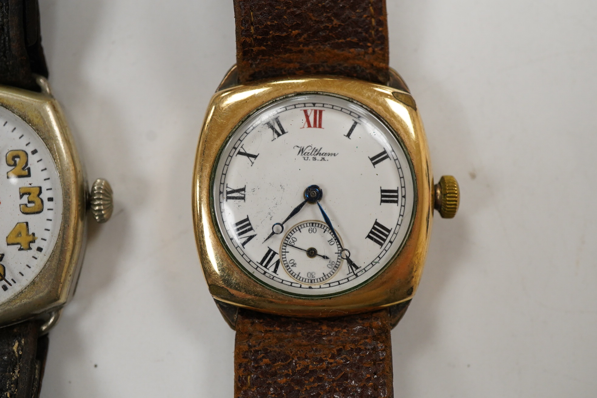 A gentleman's 1930's/1940's gold plated Waltham manual wind wrist watch, with Roman dial and subsidiary seconds, case diameter 30mm, together with a similar nickel cased manual wind wrist watch, with Arabic dial and subs